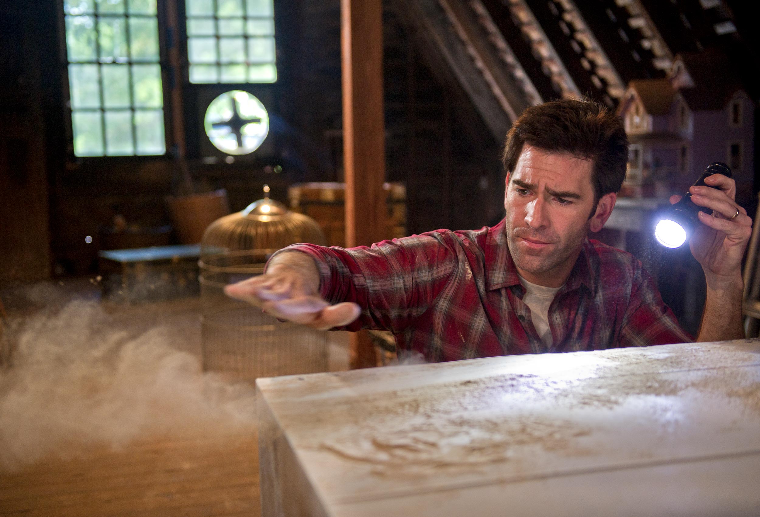 Home inspector in dusty attic for advertising campaign for Non-drowsy Claritin