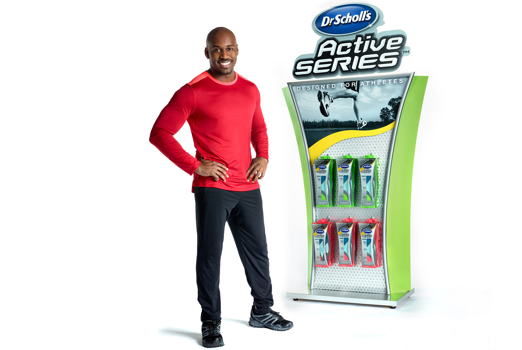 Dolvett Quince stands next to Dr. Scholl