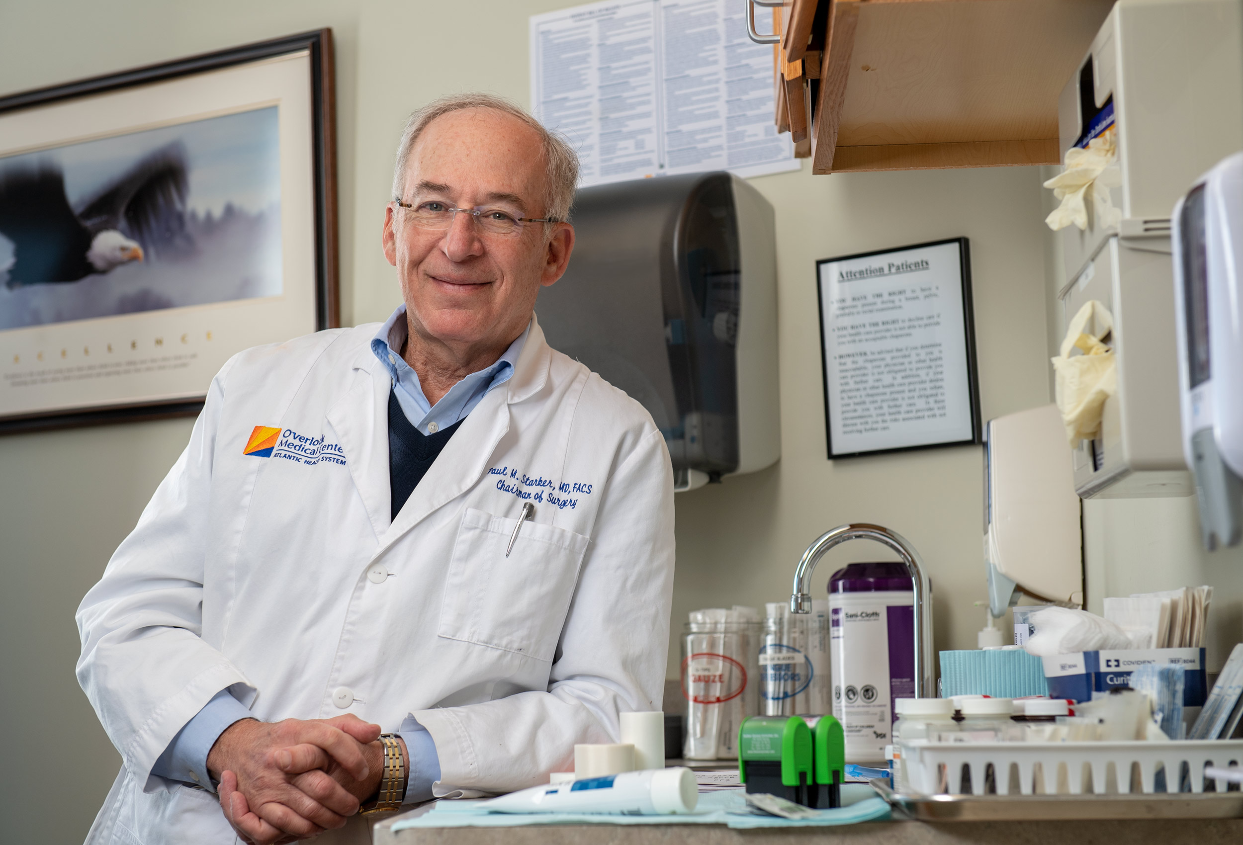 Dr. Paul Starker in exam room at Overlook Medical Center