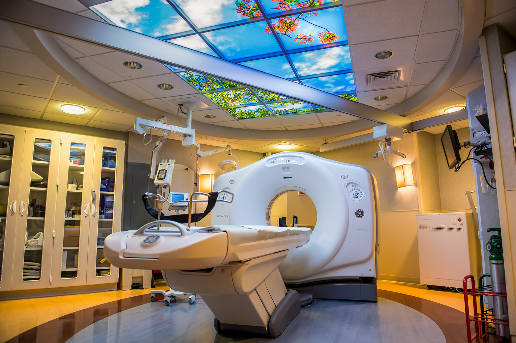 GE Discovery Scanner in hospital with faux windows on ceiling