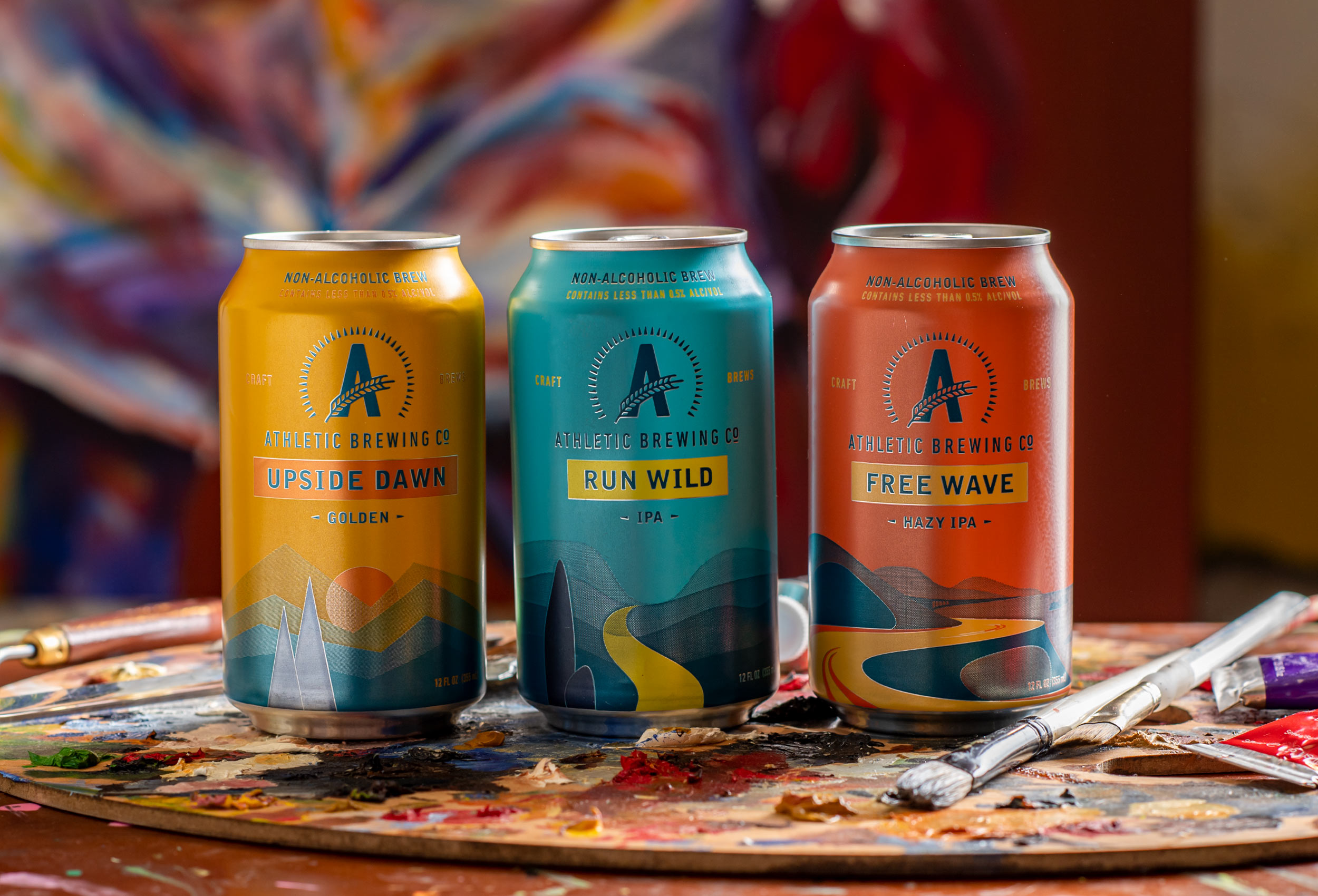 Upside Dawn, Run Wild and Free Wave cans of non-alcholic beer - product advertising photography for Athletic Brewing Co.